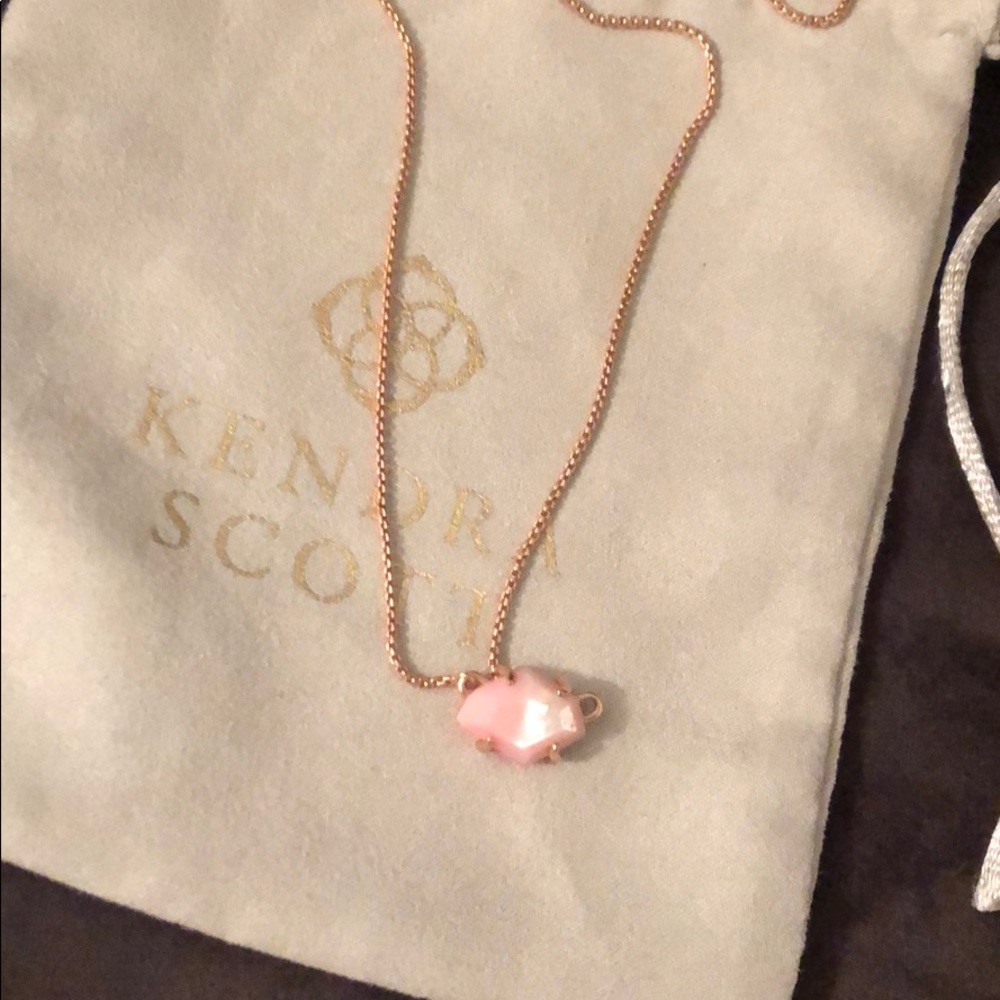 short necklace set with a pink stone
